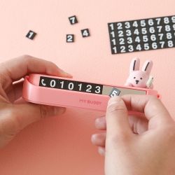 My buddy figure parking number plate