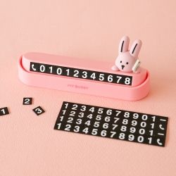 My buddy figure parking number plate