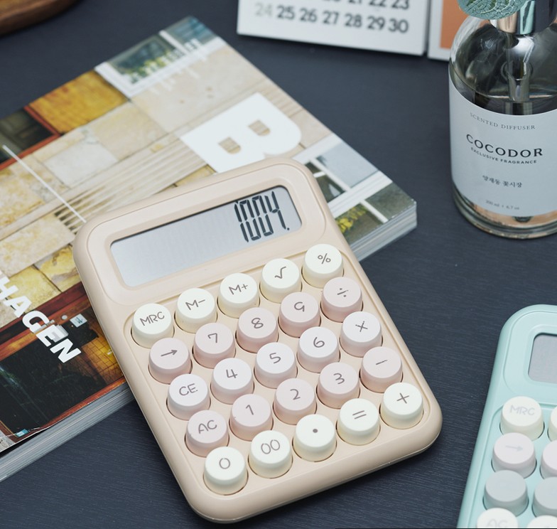 Retro cute color mechanical office calculator