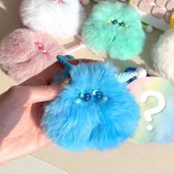 a clear-eyed mad Man Monster Random Keyring